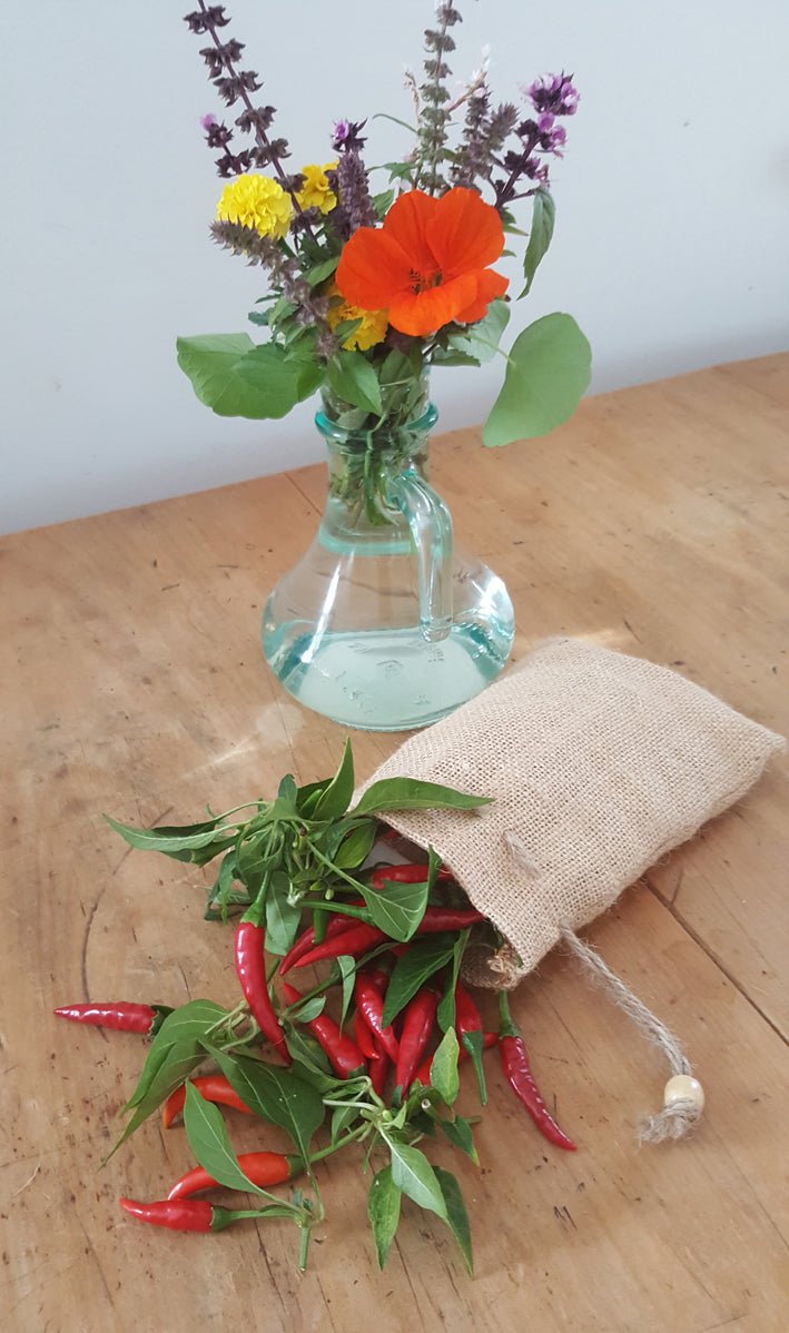 Jute Gift Bag styled with flowers and chillies